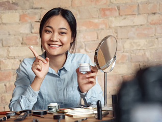 Woman trying a lotion or cream