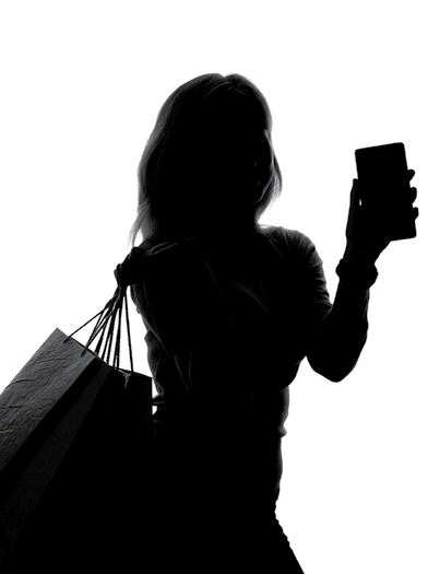 silhouette of a woman with shopping bags and a smartphone