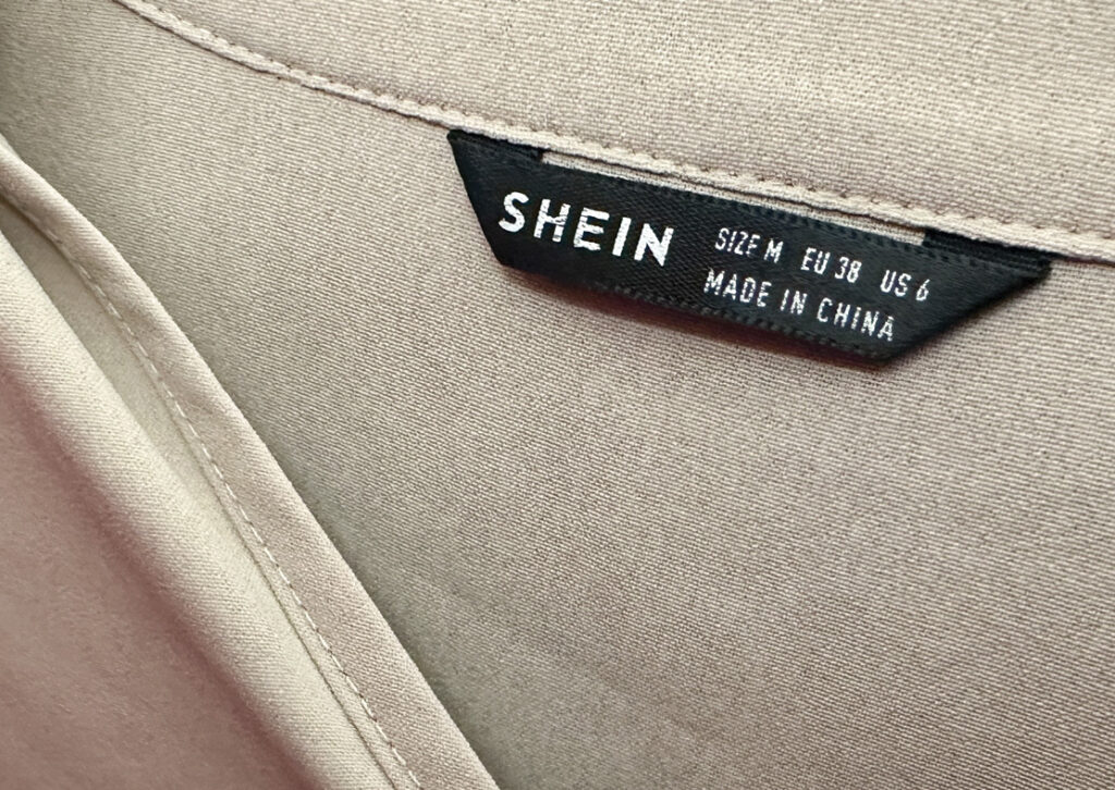 Close up of a Shein clothing brand tag
